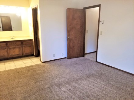 Carpet flooring in this spacious room