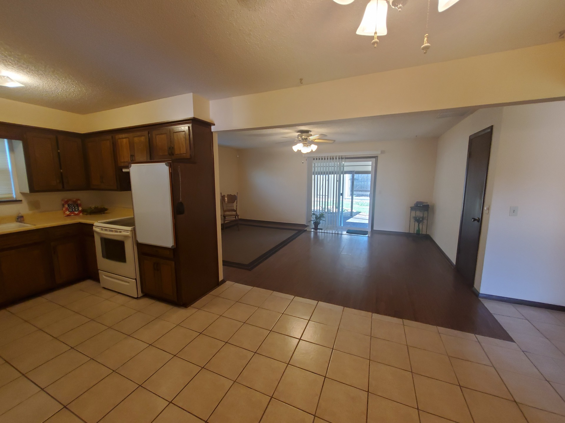 A kitchen with a tile floor