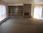 Brick fireplace and cabinets in the living room