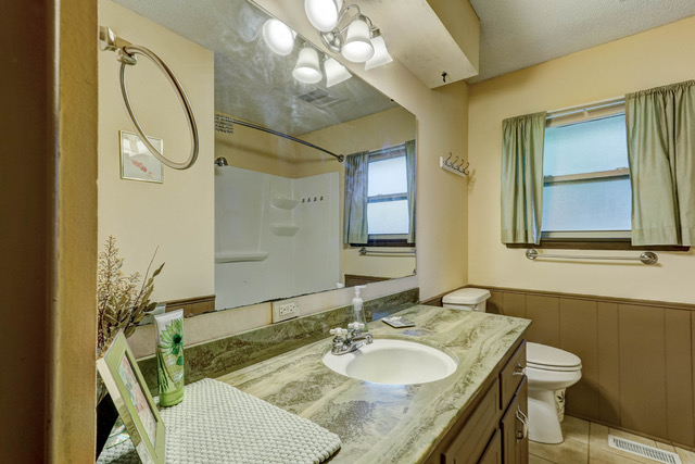 A double sink and large mirror